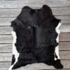 Kalbfell dunkelbraun schwarz unifarben mit weissen Flankenzeichnungen XL – Unikat – Fell-shop.ch Zürich